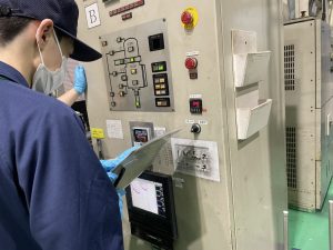 Intern setting up the furnace